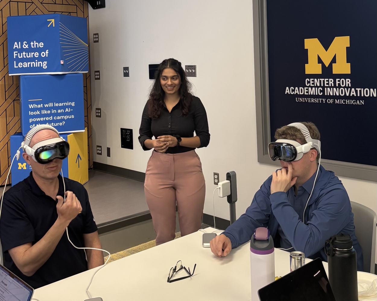 Photo of Dhruvi Jagani, Michael Nebeling, and Jeremy Nelson testing XR experiences